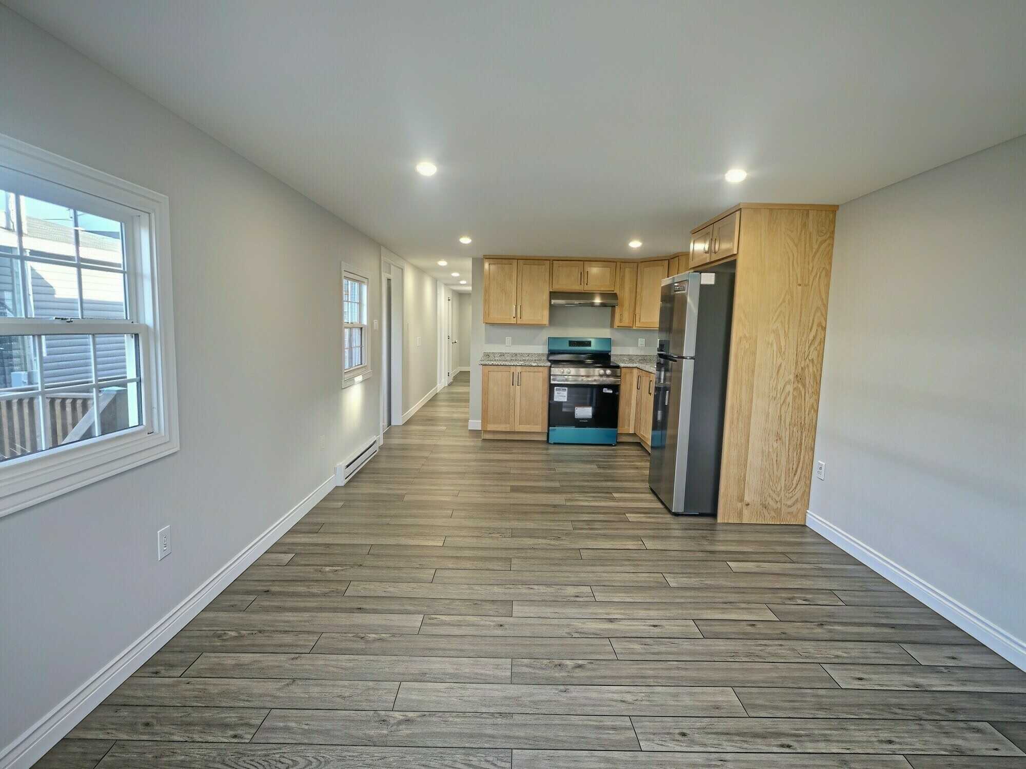Fully Renovated Two-Bedroom Home with New Roof, Siding & Decks — $240,000 4