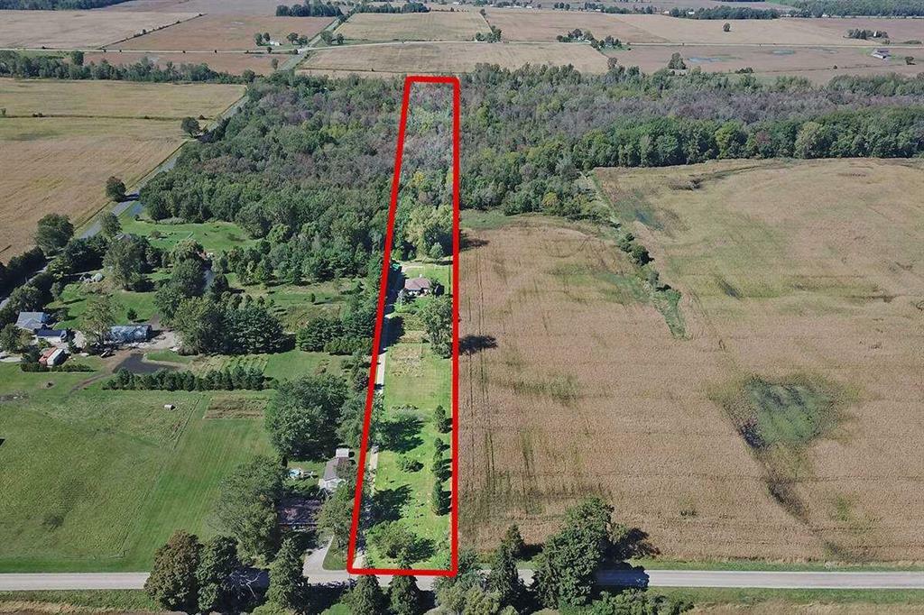 Escape the City to Your Own 5.02 Acre Country Paradise situated just outside of Dutton! 4