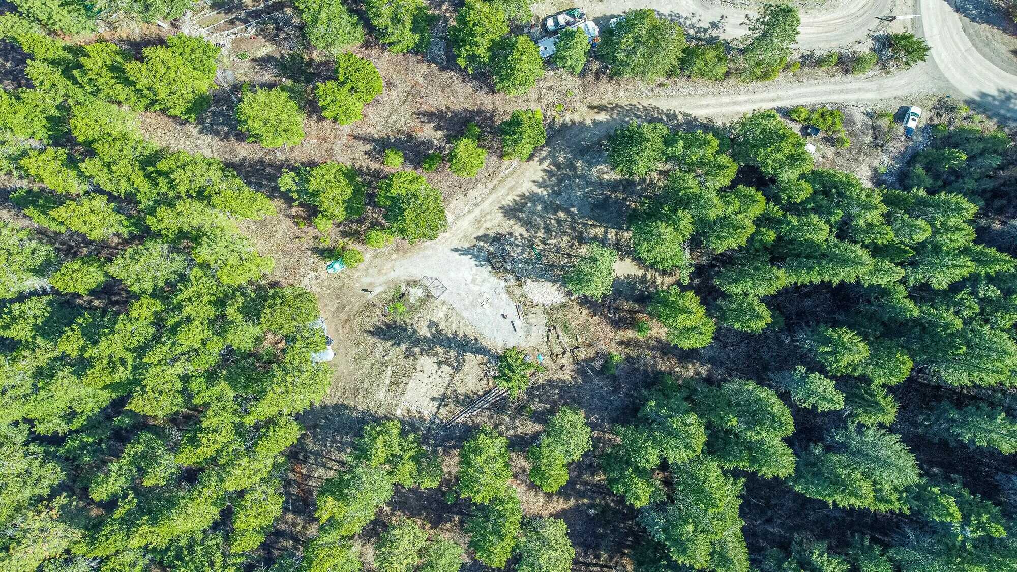 Beautiful, Open, Flat 2 acre lot in the heart of the Okanagan! Stones throw to the beach and backs onto crown land! 2