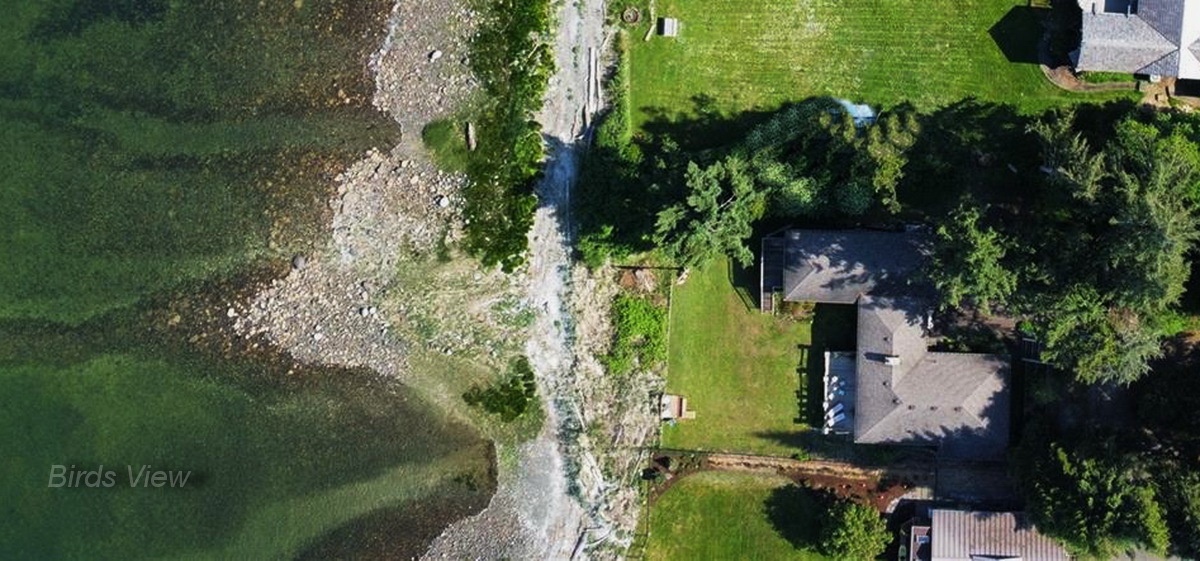 Incredible Walk-On Waterfront Property on Vancouver Island, within the Comox Valley on the east coast of Vancouver Island.  Take a short drive from this oceanfront home into Courtenay and Comox, with Nanaimo an hour away. 4