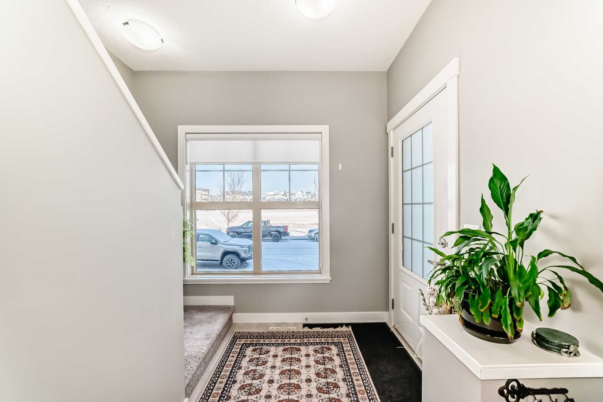 Impeccably maintained park front townhouse with double garage. 4