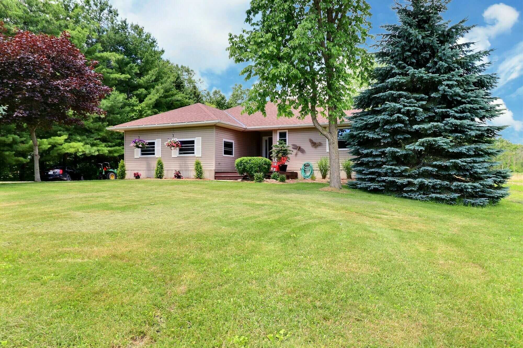 Escape the City to Your Own 5.02 Acre Country Paradise situated just outside of Dutton! 2