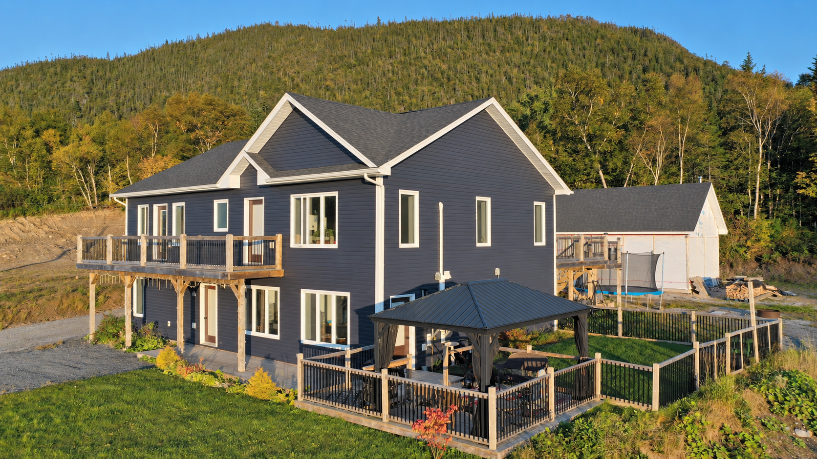 Your next adventure starts right outside your door. 3-bed, 2 full-bath home with a 2-bedroom apartment and a HUGE detached garage! 2