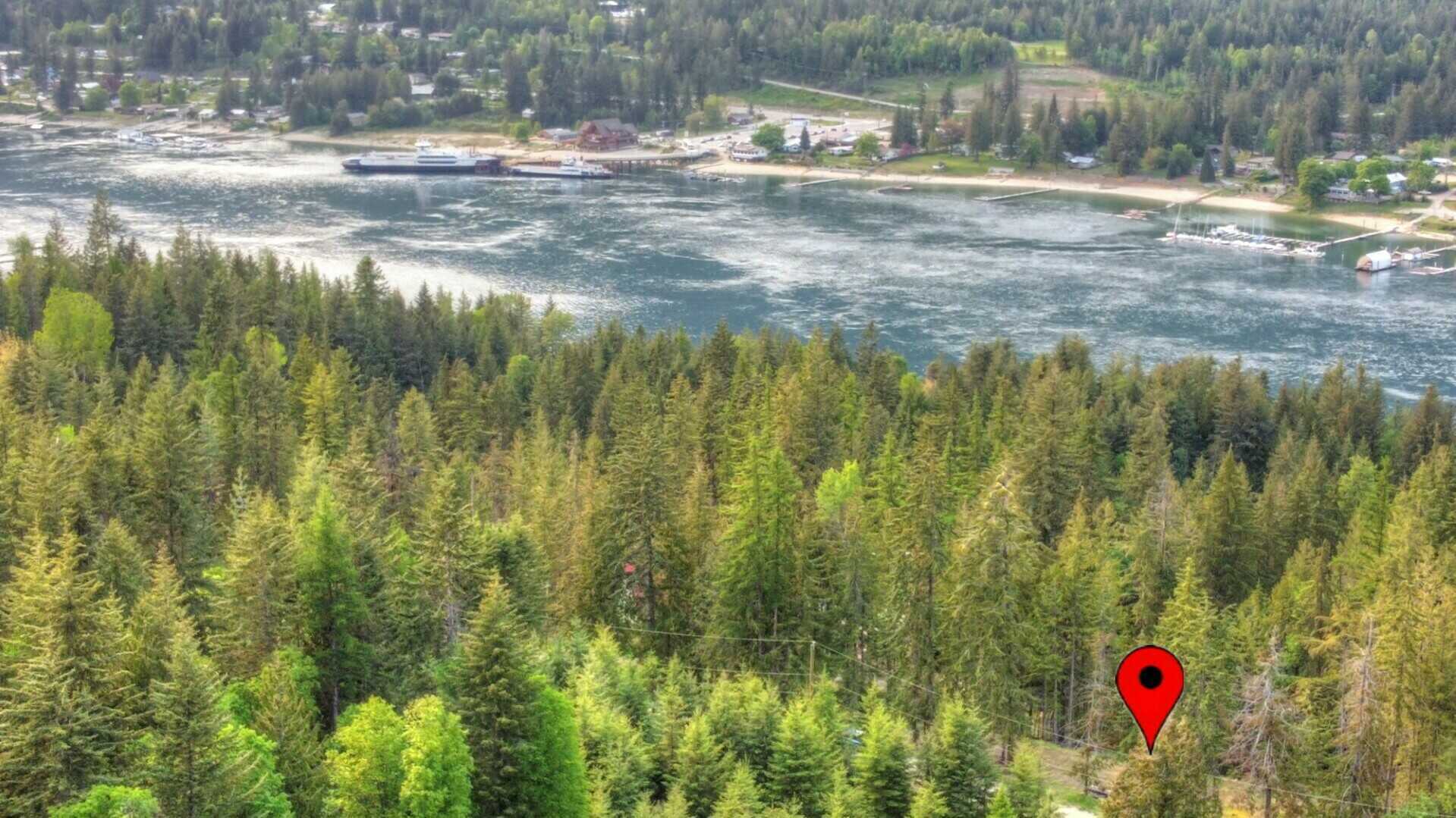 PROCTER!!  AMAZING VACANT LOT waiting for its new family!!  0.51 ACRES with EXCELLENT drilled well on site!  Awesome valley & mountain views with potential of a lake view! 4