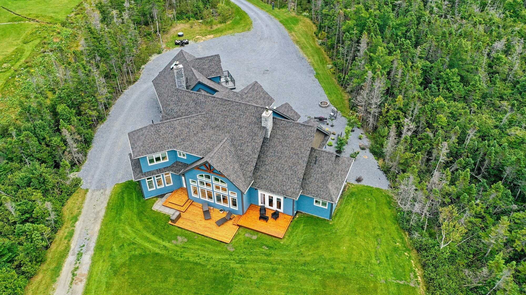 Welcome to this exquisite oceanfront executive home, where luxury meets sustainability. 5