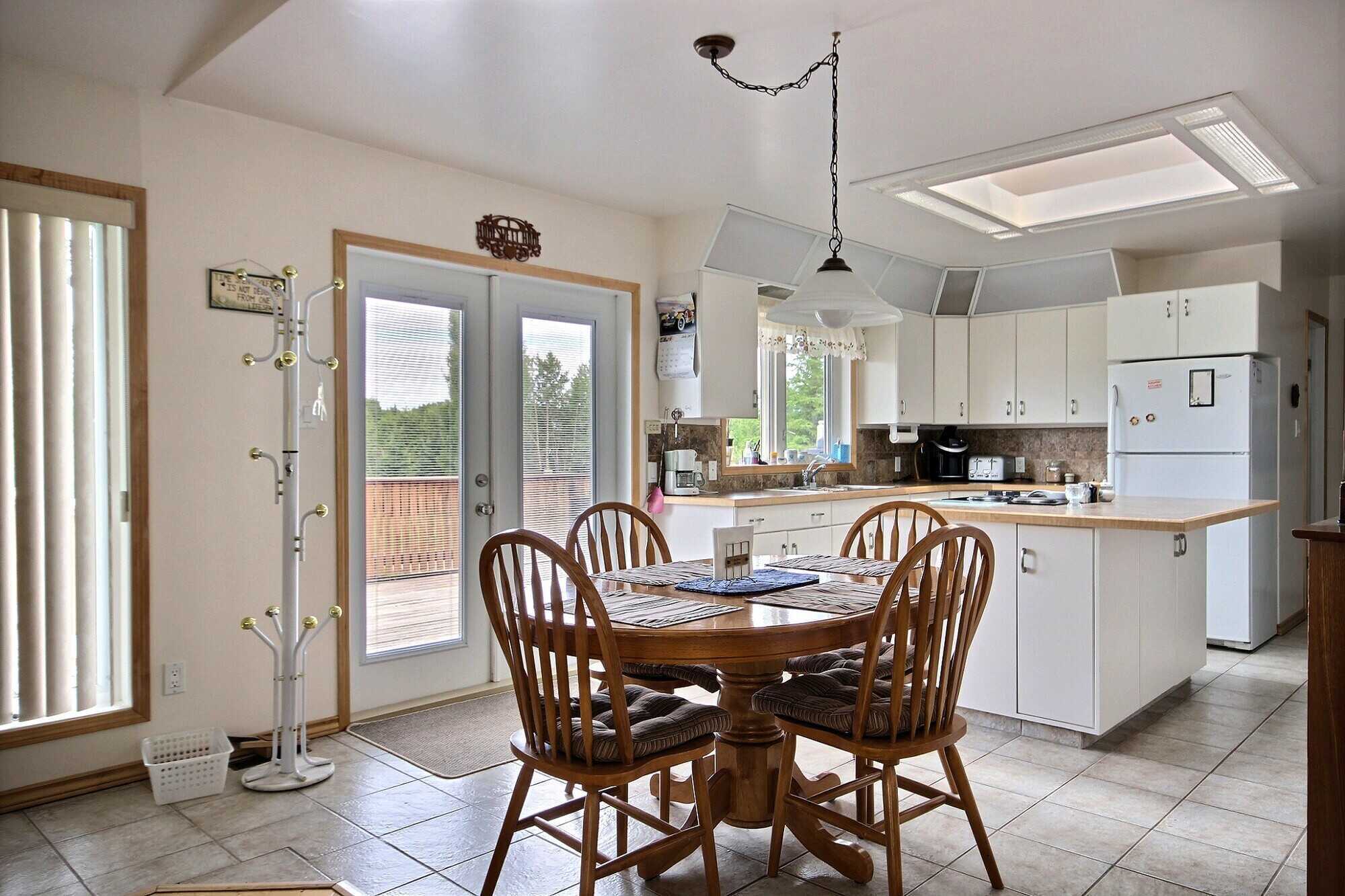 Welcome to Laurier Lake – Year-Round Living with Stunning Lake Views! 4