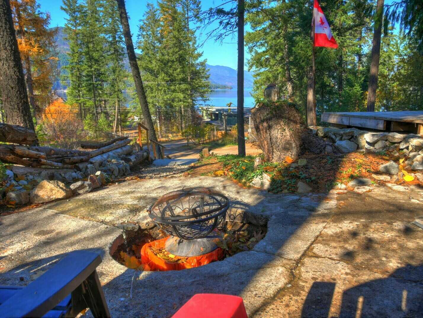 View of Christina Lake from this Fantastic Duplex Home! Each unit is 3Bed-1Bath!  Excellent Opportunity for Anyone! Potential Air BnB! Great location in a family friendly neighbourhood!  ASK ABOUT VENDER FINANCING!! 3